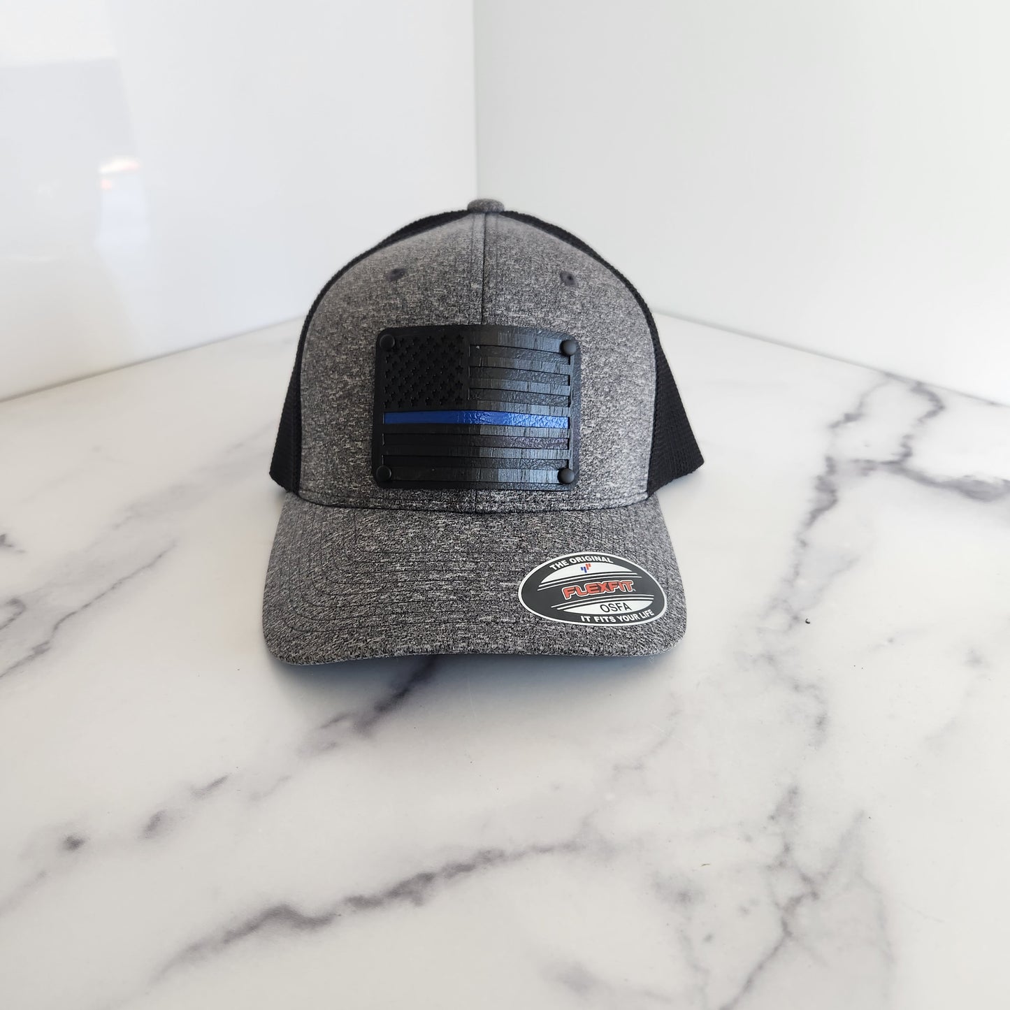 Flex Fit Trucker Hat with Black Blue Line Flag Wooden Patch
