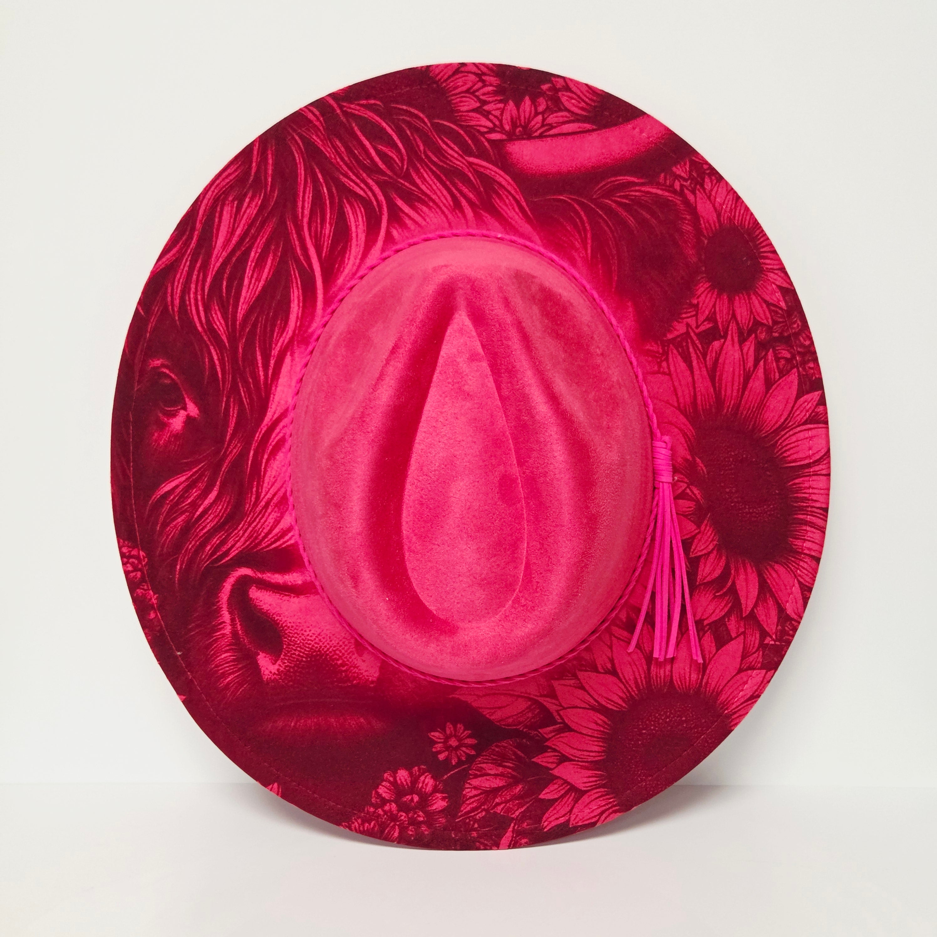Pink hat with floral pattern on a white background