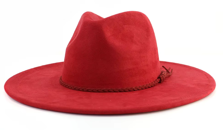 Red cowboy hat with a braided band on a white background
