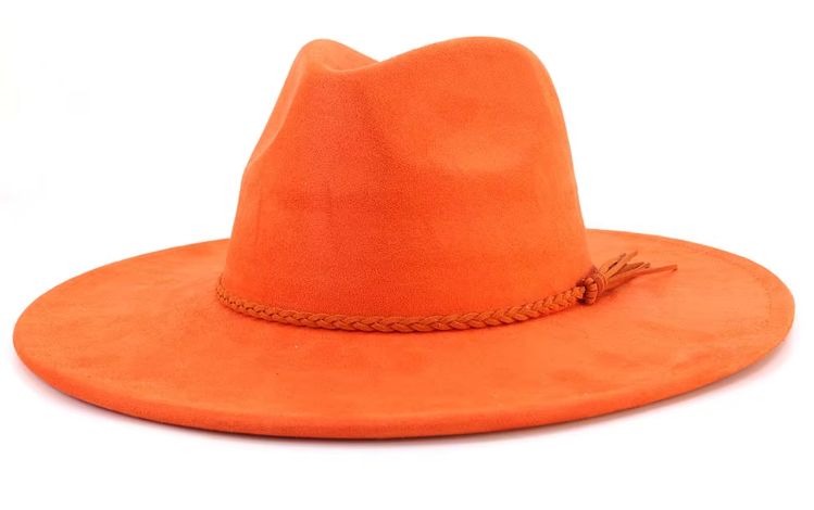 Orange cowboy hat with a braided band on a white background