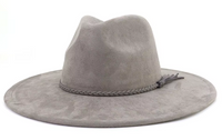 Gray suede hat with braided band on a white background